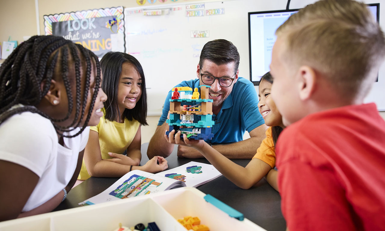 Teacher and Students Exploring Lego Education Science Project